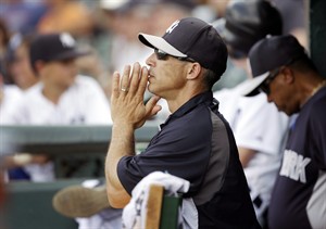 Joe Girardi of the Chicago Cubs dugout portrait before a game from