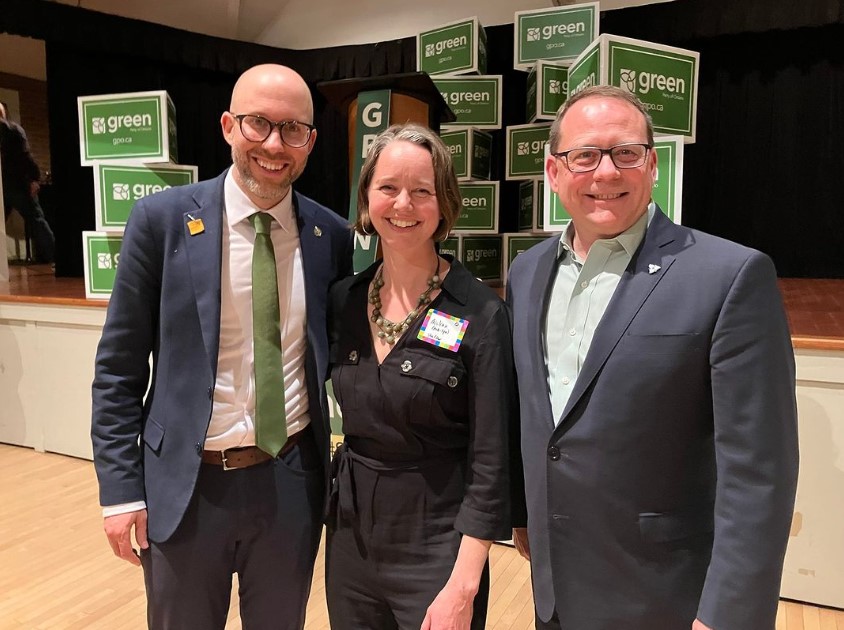 Aislinn Clancy celebrating her nomination at an Ontario Green Party alongside Kitchener Centre MP Mike Morrice and leader Mike Schreiner.