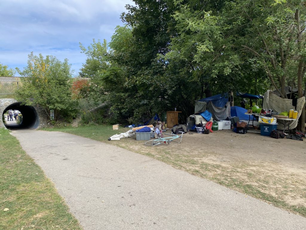 Residents of an encampment in Cambridge's Soper Park have been told they need to move on though their eviction has been delayed until Thursday