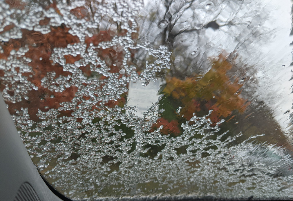 Ice pellets on a car window.