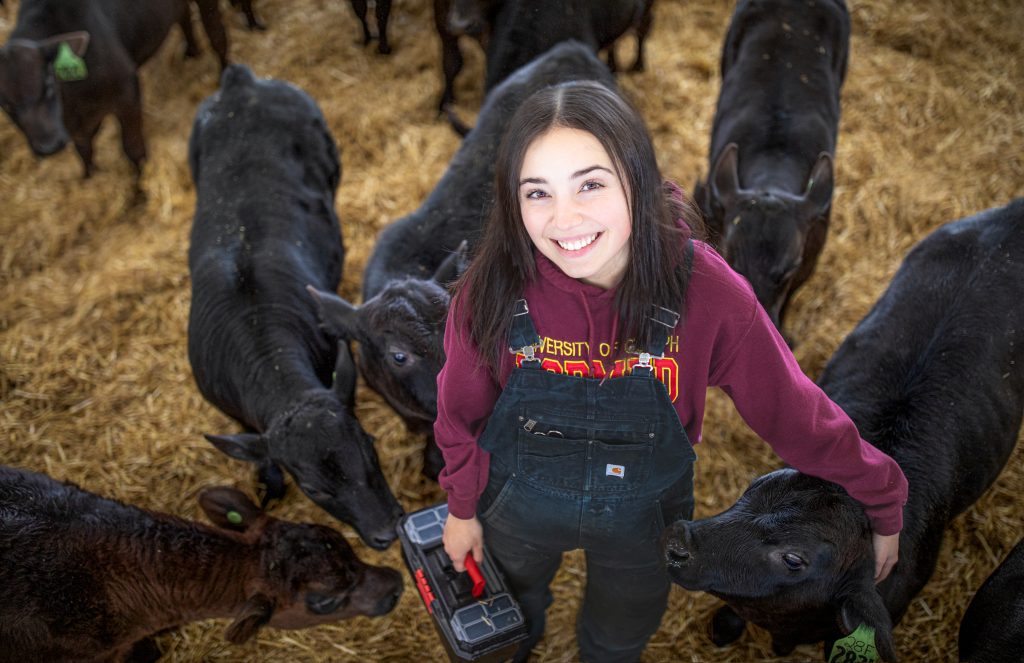 University of Guelph agriculture research student Mariah Crevier poses with her research partners for a photo.//Courtesy of the University of Guelph.