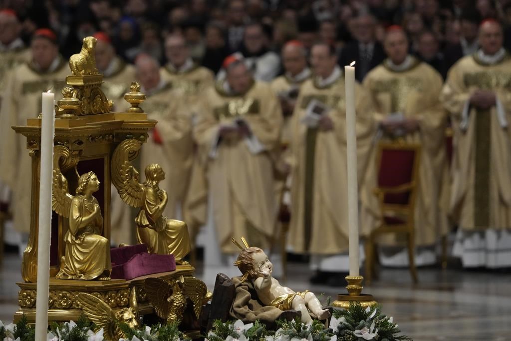 Pope says 'our hearts are in Bethlehem' as he presides over the Christmas Eve Mass in St. Peter's
