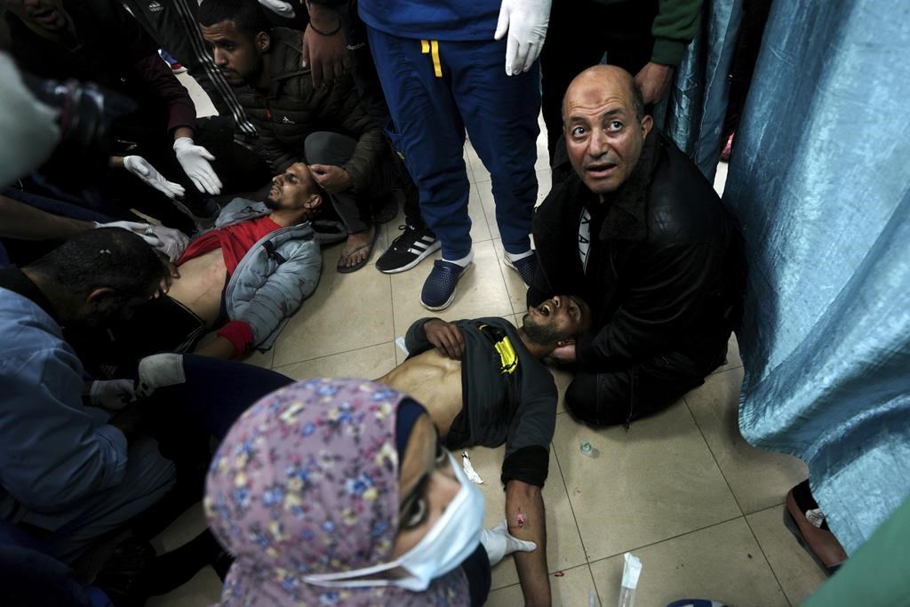 At least 68 killed in central Gaza in airstrike, adding to weekend's bloodshed