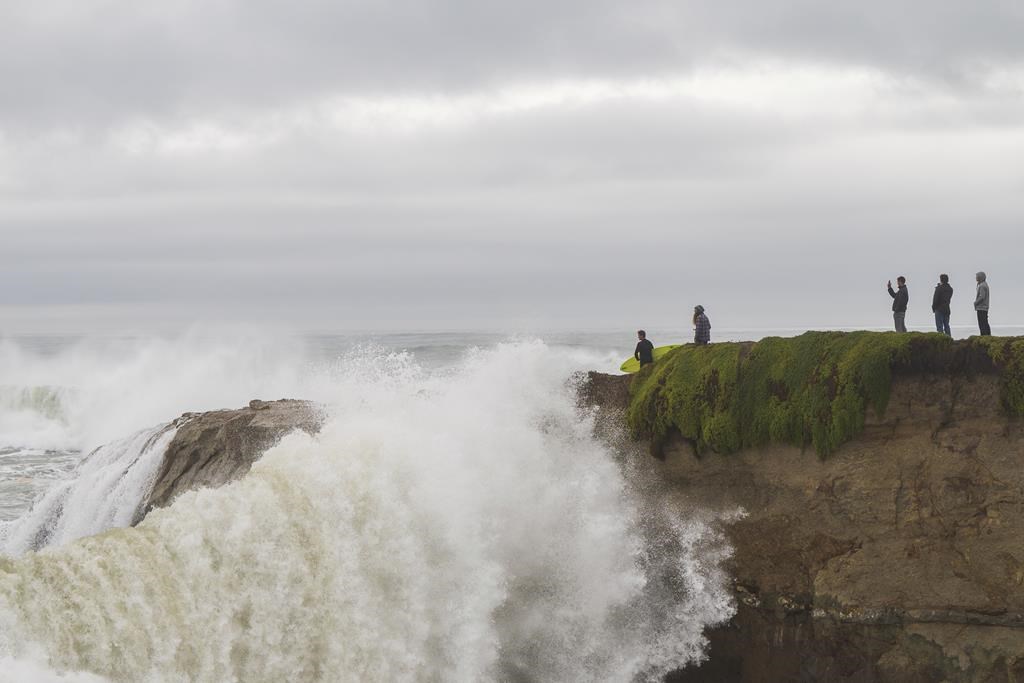 Huge surf pounds West Coast and Hawaii flooding some low lying areas