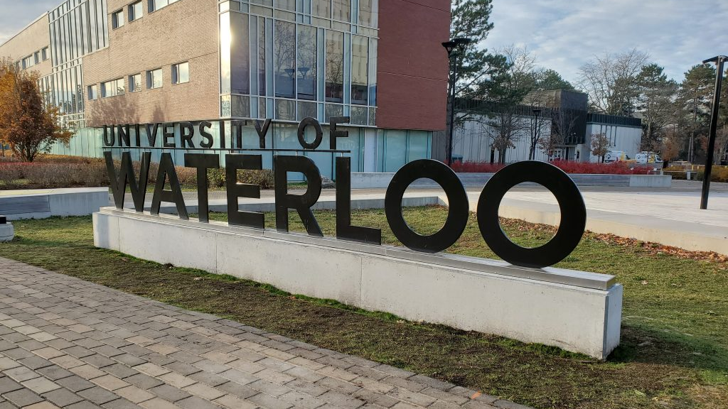 a sign for the university of waterloo