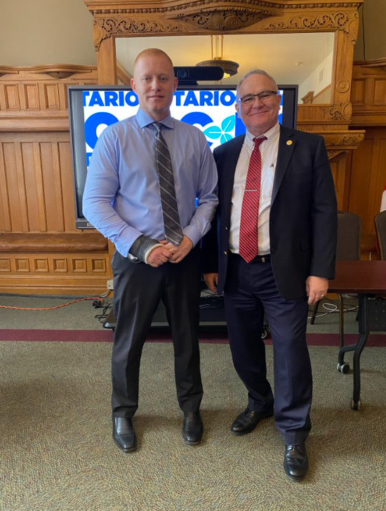 MPP Brian Riddell with Detective Adam Stover. (Brian Riddell on X)