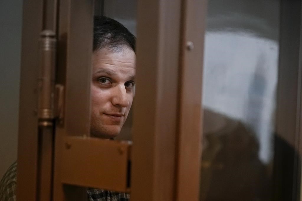US journalist marks a year in a Russian prison as courts keep extending his time behind bars