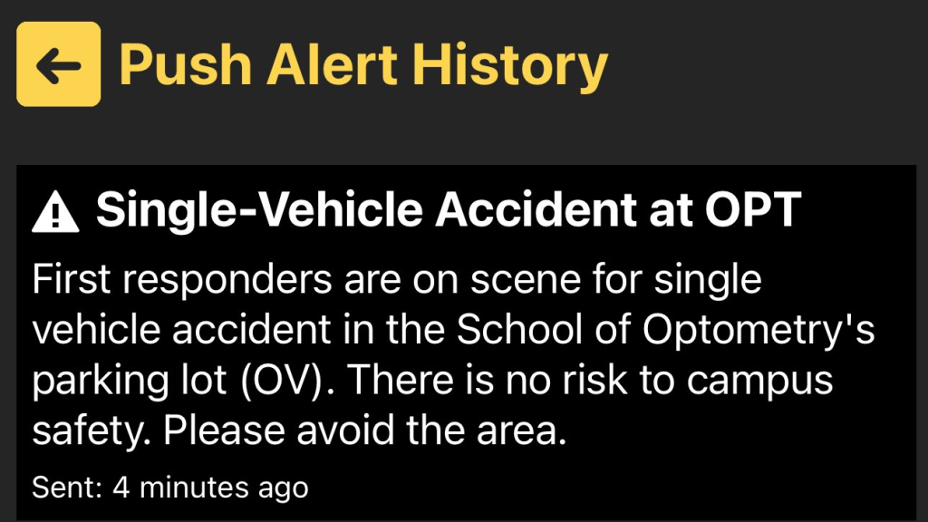 A screenshot of a push notification about a single-vehicle crash in the University of Waterloo's School of Optometry's parking lot.