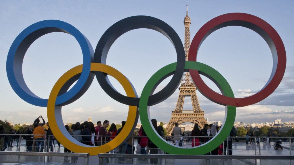 The Olympic rings are set up at Trocadero plaza that overlooks the Eiffel Tower in Paris on Sept. 14, 2017. (AP Photo/Michel Euler, File)