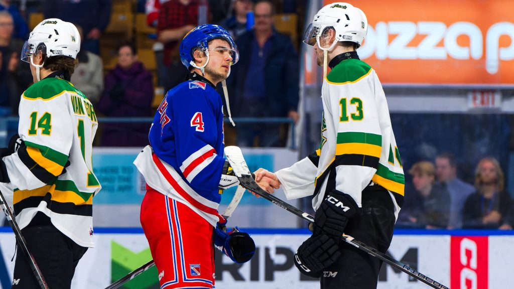 Rangers defenseman Hunter Brzustewicz shaking hands with London Knights players after Thursday's 4-3 loss
