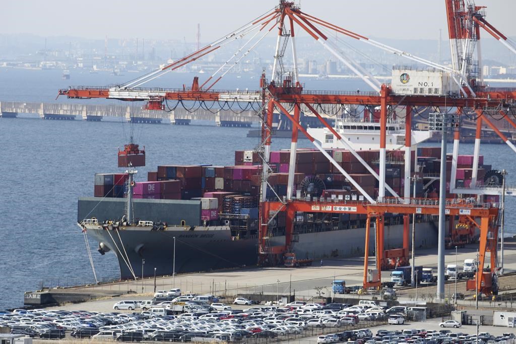 Japan records a trade deficit for the third straight fiscal year despite recovering exports
