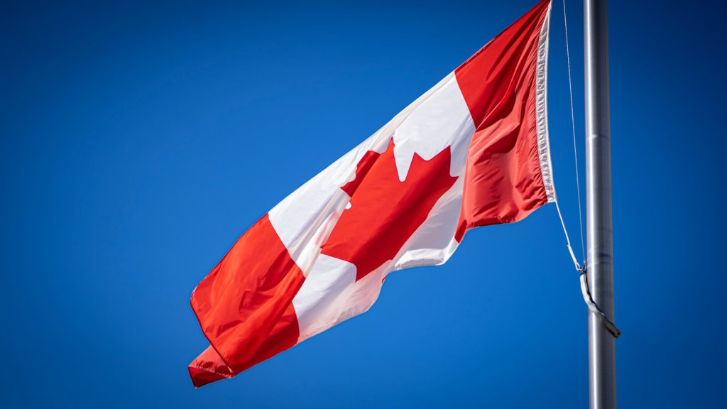 A Canadian flag being flown at half mast. (CityNews File Photo)