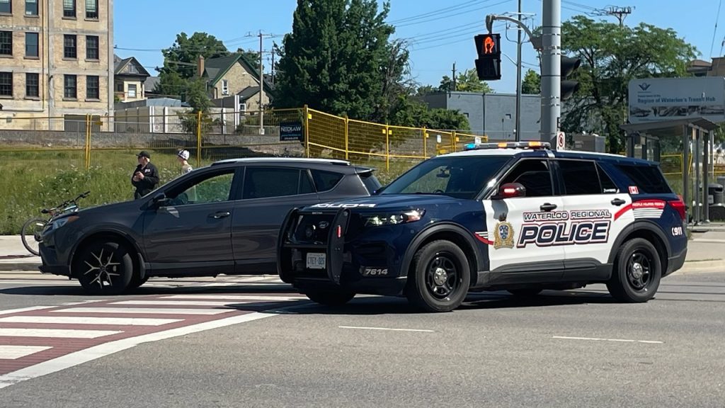 A police cruiser remains on scene following a collision in Kitchener, at the intersection of King Street West and Victoria Street North in Kitchener.