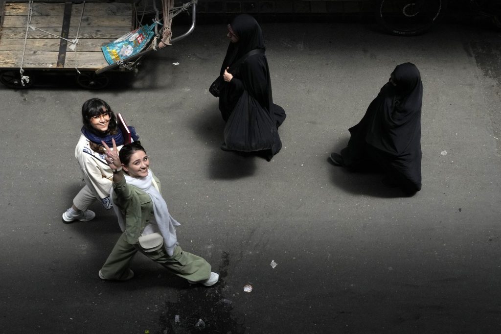 As Iran's presidential vote looms, tensions boil over renewed headscarf crackdown