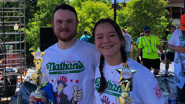 Competitive Eater Darien Thomas poses next to fellow competitor Kat Wong at the Nathan's Famous Hot Dog Eating Contest qualifier in Syracuse, New York.