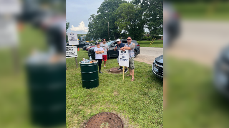 Members of United Steelworkers union (USW) Local 4045 walking the picket line for fair treatment at Cambridge Brass.