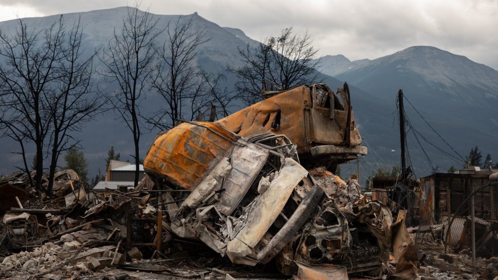 A small pile of burnt cars in Jasper, Alta.,