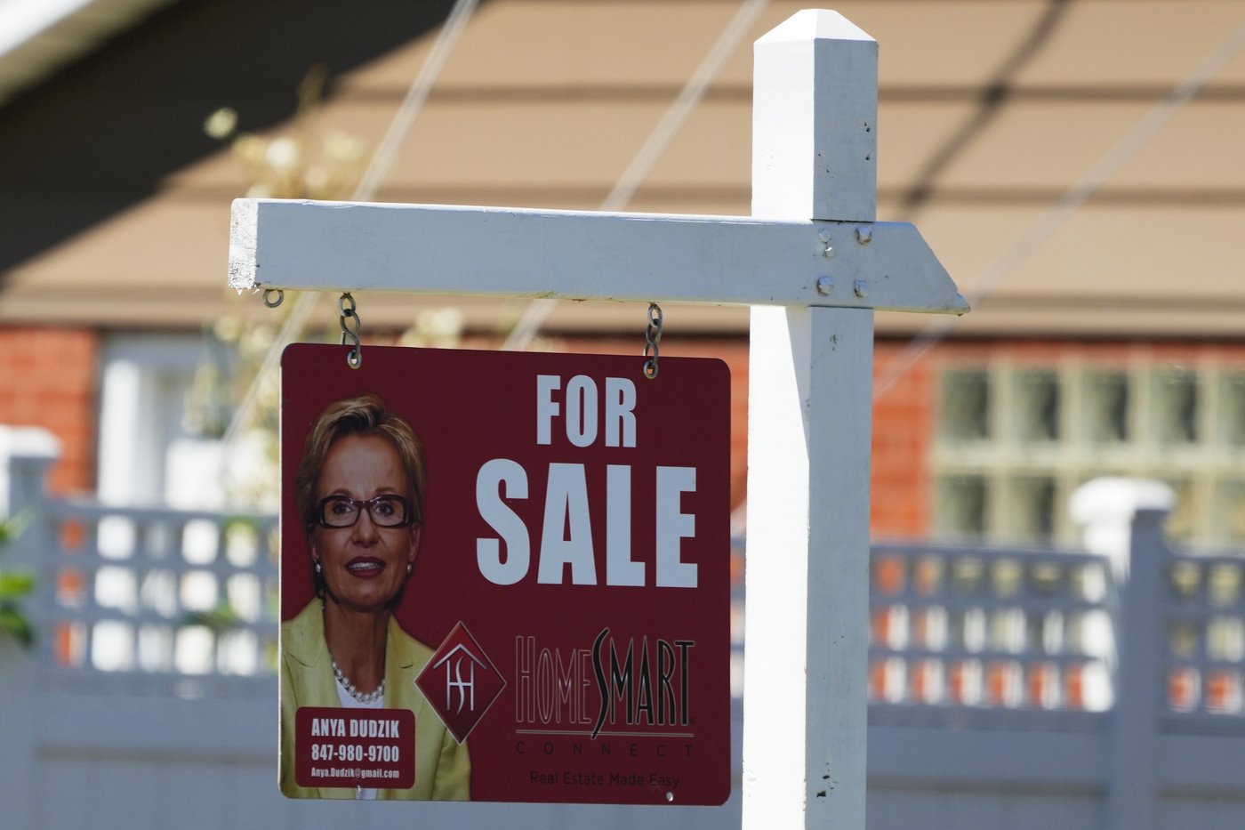 Average rate on a 30-year mortgage climbs for the first time since late May  to just under 7%