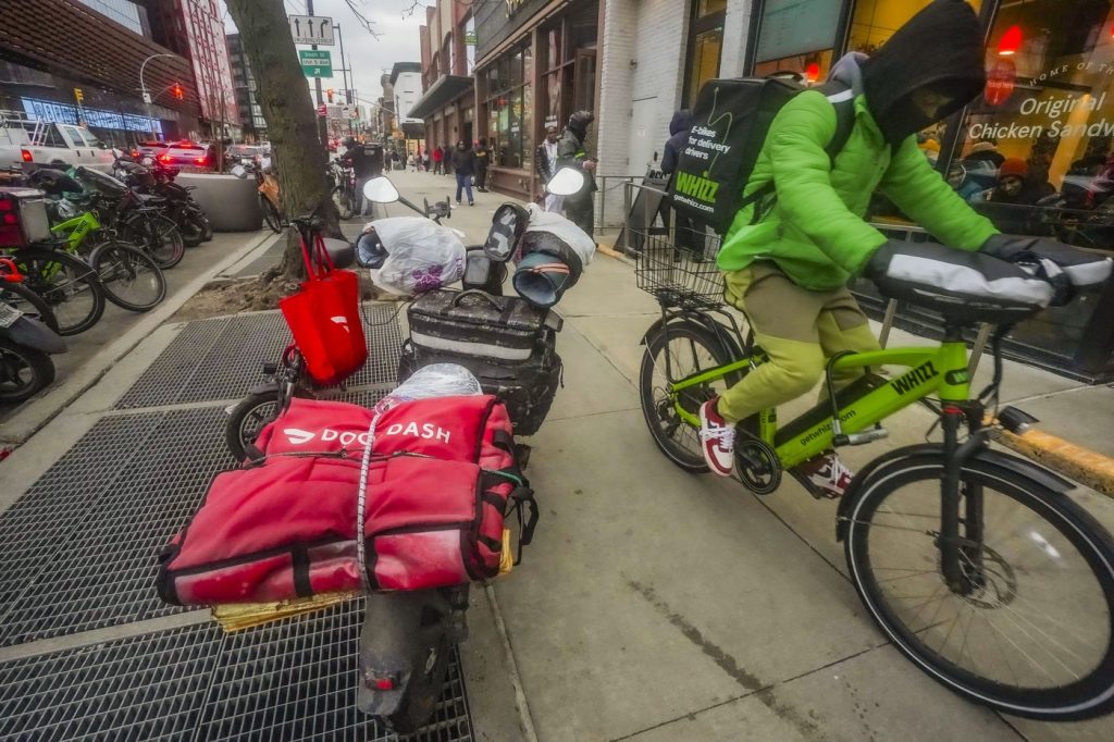 Under pressure from cities, DoorDash steps up efforts to ensure its