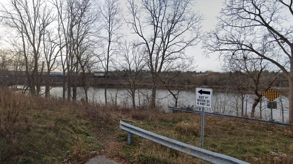 Police retrieve vehicle from Grand River; shooting investigation underway