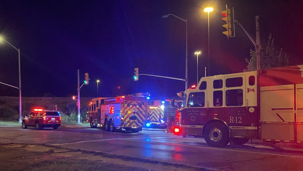 Emergency crews block the Homer Watson Boulevard ramp to HWY 7/8 west, responding to a reported fire in the bush nearby. (Mark Douglas/ 570 NewsRadio)