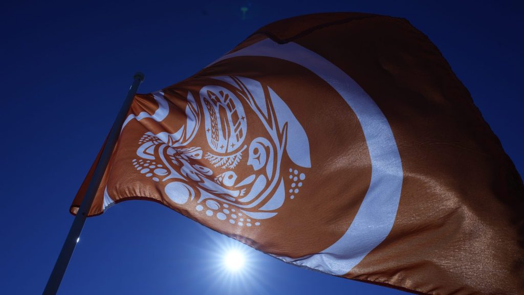 The Survivors flag flies on Parliament hill ahead of ceremonies to mark National Day for Truth and Reconciliation, Monday, September 30, 2024 in Ottawa. (THE CANADIAN PRESS/Adrian Wyld)