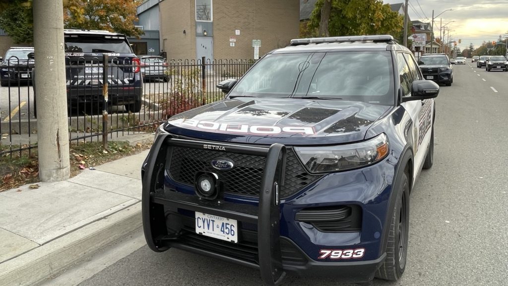 Police cruisers outside of 140 Weber Street East in Kitchener investigating a stabbing that took place on Friday. (Mark Douglas/570 NewsRadio)