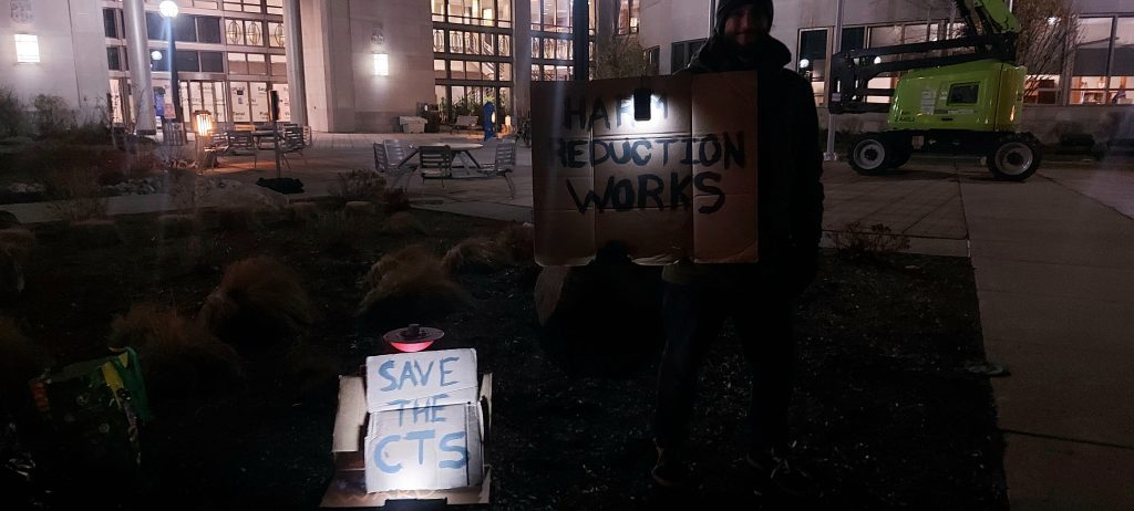 A sign put up during a rally Nov. 27 to help save the Consumption and Treatment Services site from closing in Kitchener. (Justine Fraser, CityNews Kitchener)