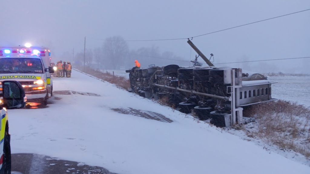 Transport truck slides off road near Stratford