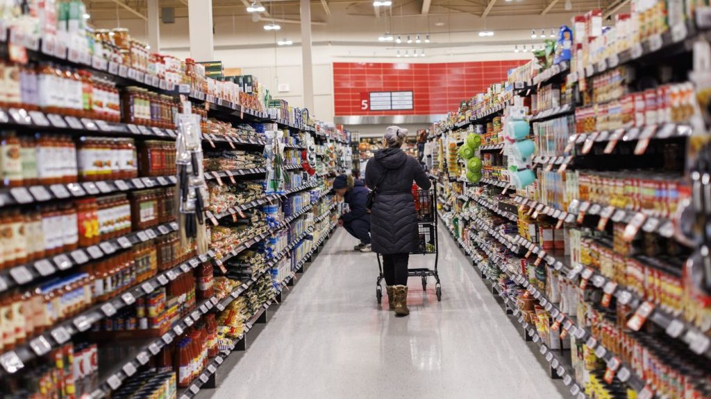 A customer browses an aisle at a Metro grocery store In Toronto on Feb. 2, 2024. THE CANADIAN PRESS/Cole Burston