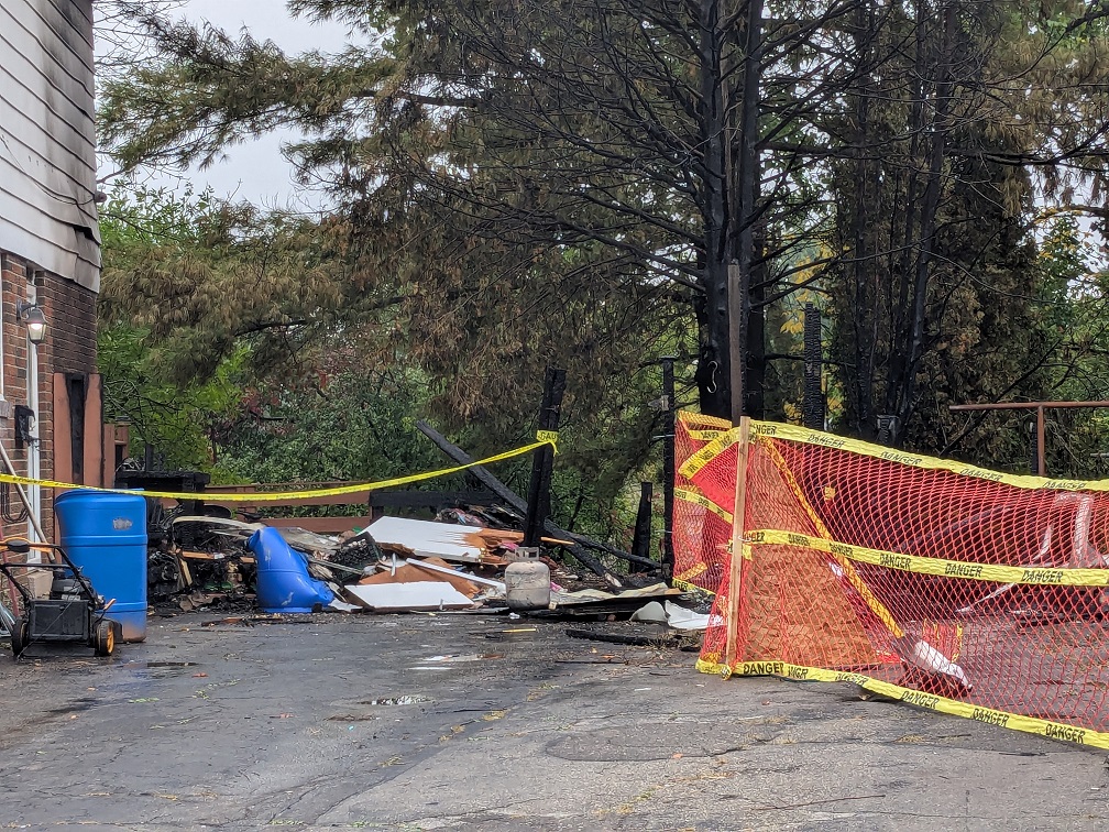 The aftermath of fires at two semi-detached homes.