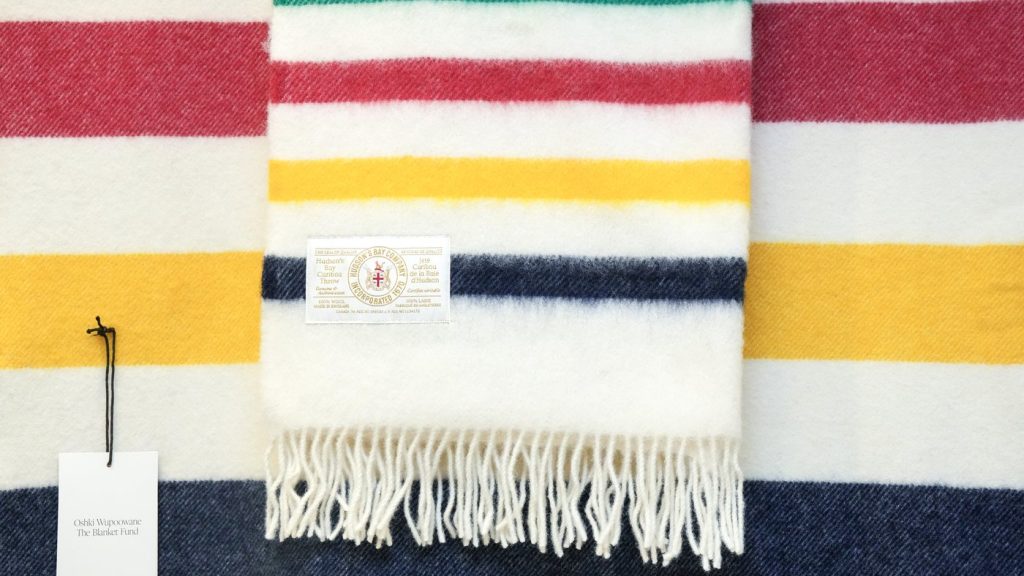 A blanket is on display at the Canadian Tire's relaunch of the HBC brand and stripes in Toronto on Monday, November 3, 2025. THE CANADIAN PRESS/Chris Young