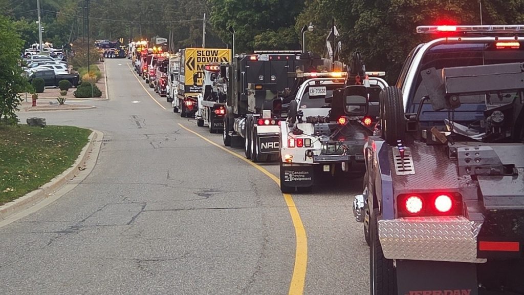 A tow truck procession is taking place to honour an operator killed on Highway 401. (Credit: Krystal Degen via Facebook)