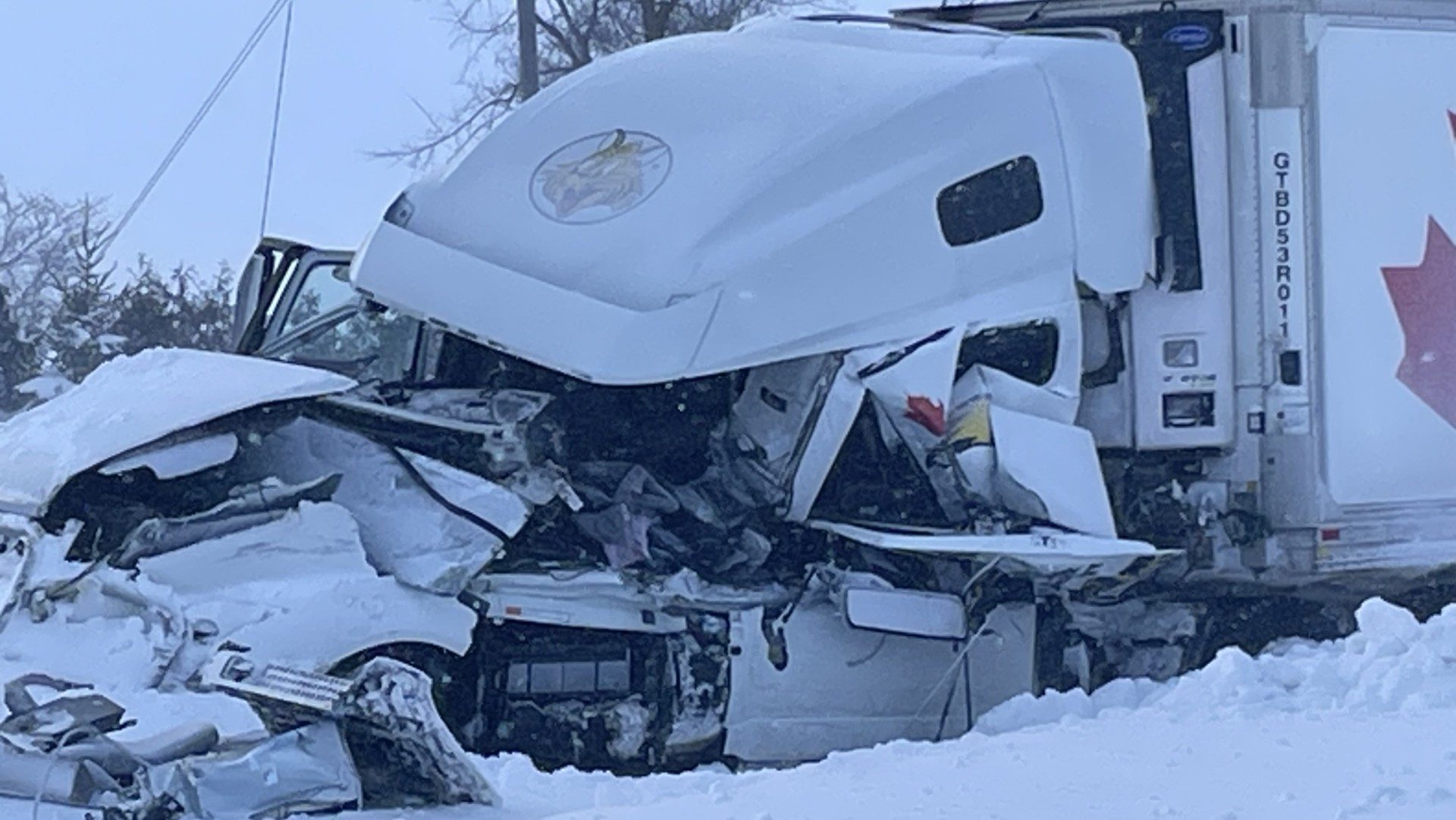 Charges laid against transport truck driver after double crash on Line 86