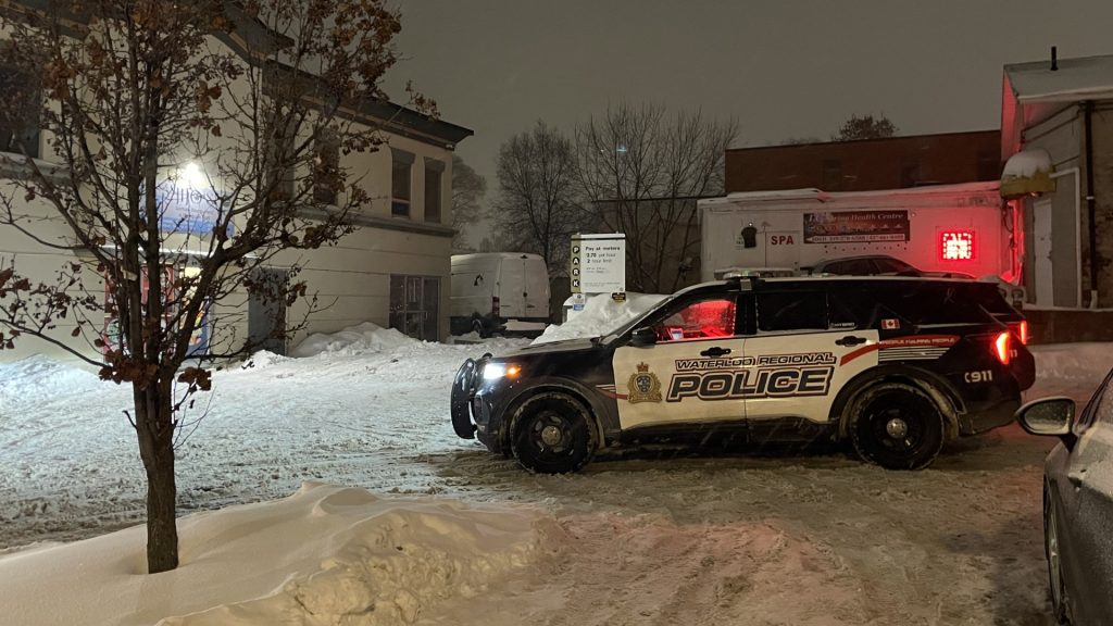 Police cruisers at the scene of a shooting in the King/Scott area. (Mark Douglas / 570 NewsRadio)