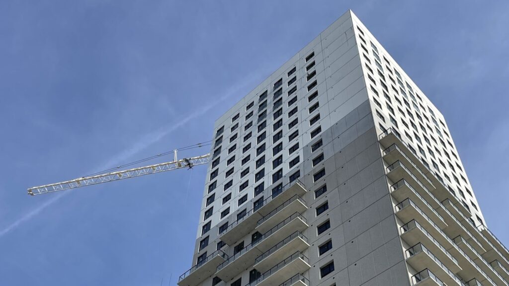 Police laid charges after three people were caught climbing a crane trying to enter an under-construction building. (Mark Douglas/ CityNews)