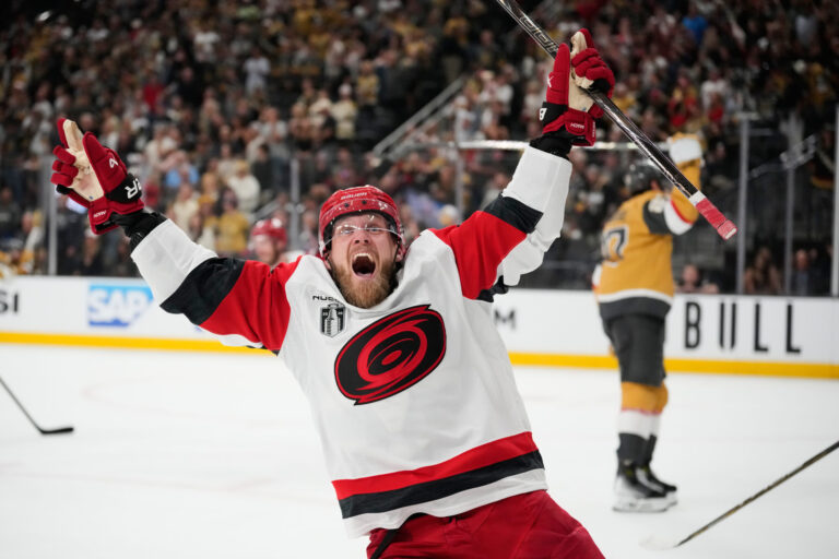 Carolina Hurricanes left wing Nikolaj Ehlers (27) celebrates after scoring an empty-net goal during the third period in Game 6 of the NHL hockey Stanley Cup Final series against the Vegas Golden Knights, Sunday, June 14, 2026, in Las Vegas. (AP Photo/John Locher)